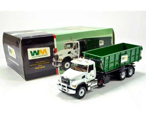 First Gear 1/34 scale diecast truck issue comprising Mack WM Dump Truck. E to NM in Box.