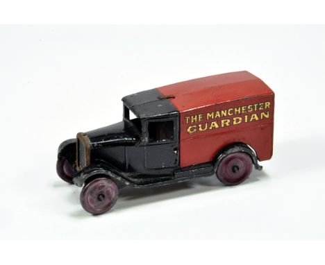 Dinky No. 28C Pre-war Delivery Van Manchester Guardian. Black and Red with gold lettering with black outline depicting Manche