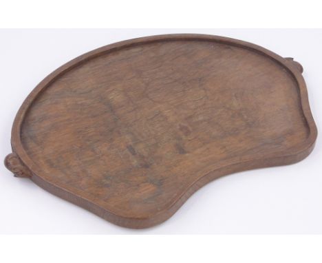 A Robert Mouseman Thompson kidney shaped oak tea tray,with carved mouse handles, length 18.5".