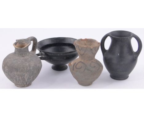 4 ceramic antiquities,comprising a Greek black glazed 2-handled shallow bowl 4.75" diameter excluding handles and 3 other sma