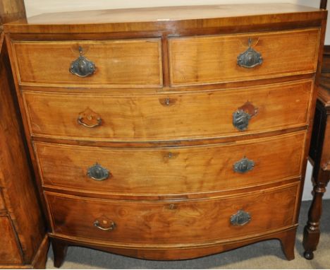 A Georgian mahogany bow front chest of drawers,raised on bracket feet, width 3'9", height 3'8", depth 1'9".