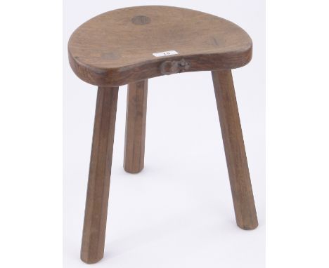 A Robert Mouseman Thompson oak 3 legged stool,with carved mouse on the front edge, seat width 11.5", height 14".