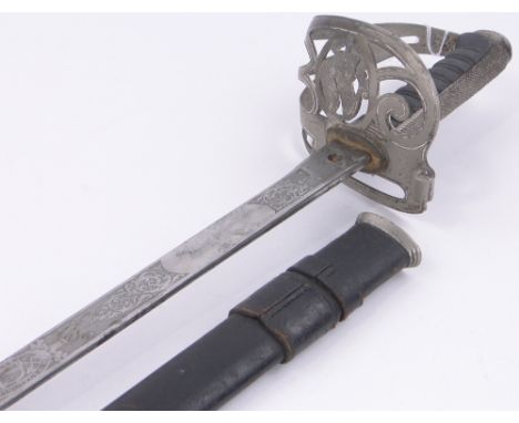 A Royal Irish Constabulary Officer's dress sword,1911-1921 blade signed T G Phillips, 4 Dame Street, Dublin with shagreen cov