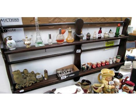 A mahogany hanging shelf