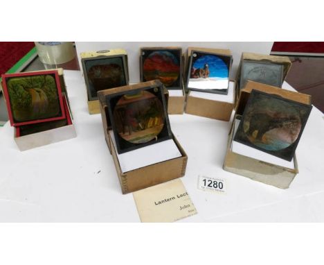 7 sets of magic lantern slides including volcanoes, comical cat and dogs, The Nile etc