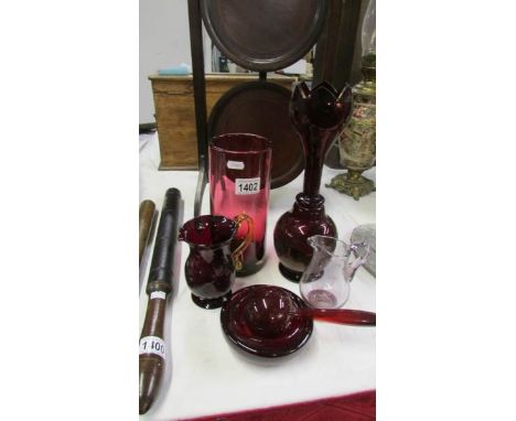 5 pieces of ruby glass and an amethyst glass jug