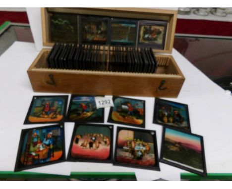 A quantity of boxed magic lantern slides