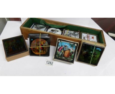 A box of assorted magic lantern slides