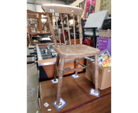 A 19th century stick back farm house chair