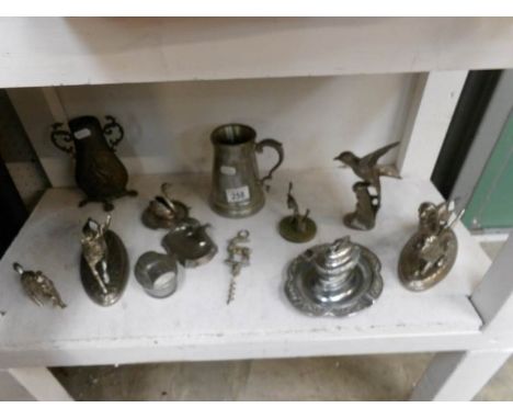 A mixed lot of metalware including animals, lighter etc