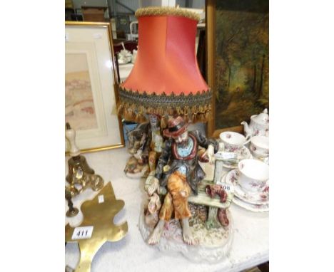 A Capi-di-Monte figure group and a Capo-di-monte table lamp