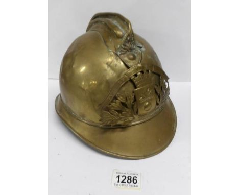 A brass French fire fighters helmet from Mirson