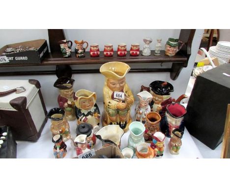 A quantity of Toby jugs including 4 Goebel monk jugs and 2 Wade figure of pearly king and queen