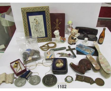 A mixed lot of good collectibles including Beswick cat, medals, porcelain portrait etc
