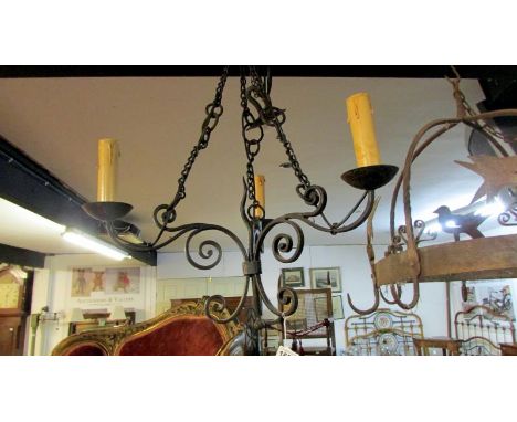 A wrought iron 3 lamp ceiling light