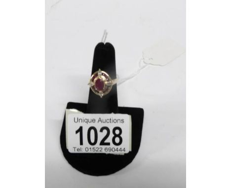 A ruby and diamond ring size Q