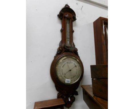 A large oak barometer
