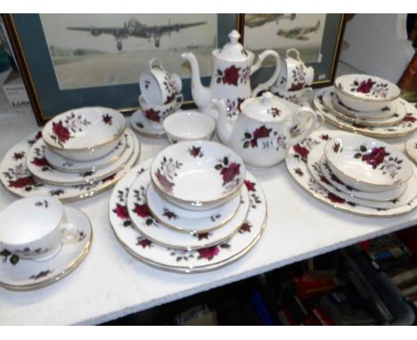 44 pieces of Colclough rose decorated tea and dinnerware
In good condition with no damage observed, but teapot has some stain