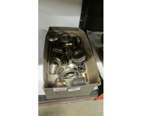 A box of candlestick lamp shade supports