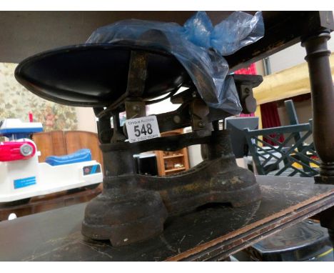 A set of old scales and lots of weights