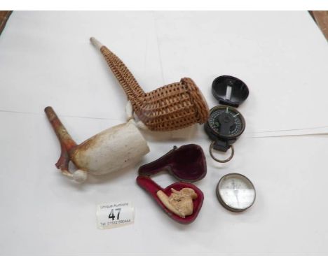 2 compasses, a meerscham pipe and 2 clay pipes with a mounted foot and football