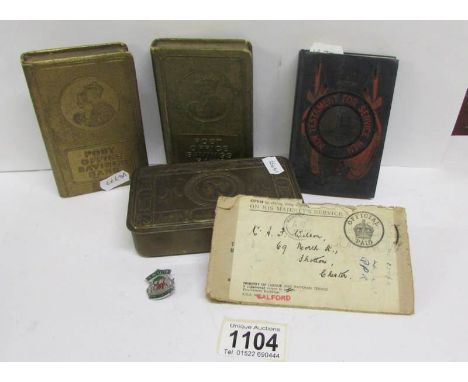 A WW1 Christmas tin, A WW1 army/navy bible and 2 post office savings banks