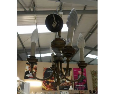 A 4 lamp brass ceiling light