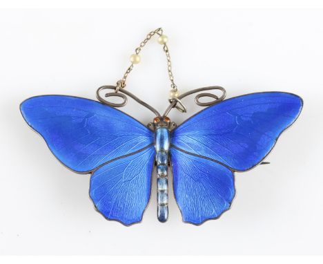 A Norwegian butterfly brooch by Maris Hammer, having blue enamel body, with pearl set chain between antennae, stamped 930S St