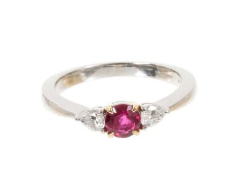 Tiffany &amp; Co. ruby and diamond three stone platinum ring, the round mixed cut ruby estimated to weigh approximately 0.40c