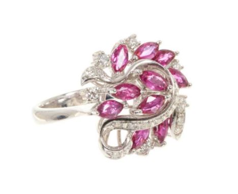 Ruby and diamond cocktail ring with eleven marquise cut rubies estimated to weigh approximately 2.29cts in total, with brilli