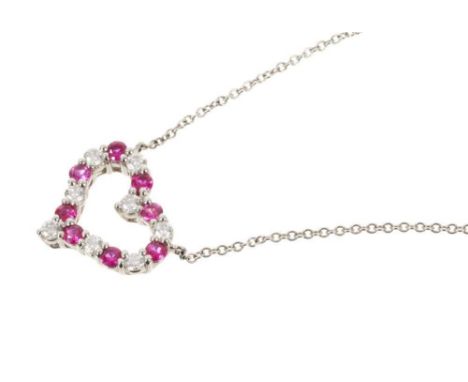 Tiffany &amp; Co. diamond ruby and platinum heart pendant necklace with eight brilliant cut diamonds interspaced by eight rou