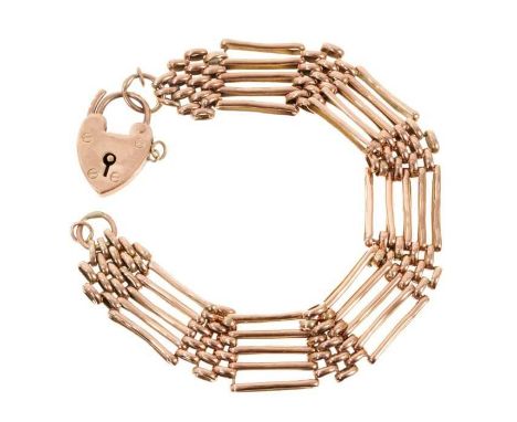 Edwardian 9ct rose gold gate bracelet with padlock clasp, approximately 18.5cm.16.5 grams 
