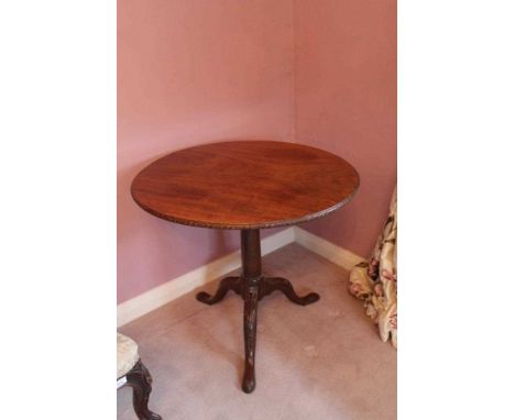 George III mahogany tripod table with tilt top on birdcage mechanism, cannon barrel column and three hipped splayed legs with