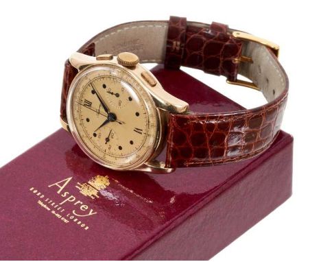 Gentleman's Asprey gold chronograph wristwatch with manual wind movement, the circular gold dial with two subsidiary dials re