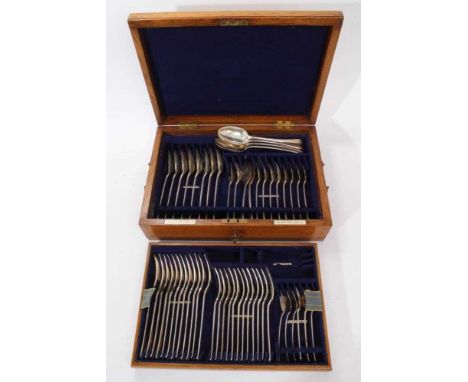 Composite set of early 20th century silver Old English pattern flatware, including 12 tablespoons, 9 dessert spoons, 12 dinne