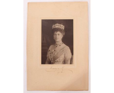 H.M.Queen Mary, signed presentation portrait photograph of the Queen wearing jewels and The Order of The Garter, signed in in