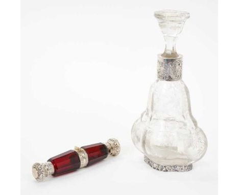 Victorian double ended ruby glass scent bottle with white metal mounts and hinged at the centre, together with a German silve