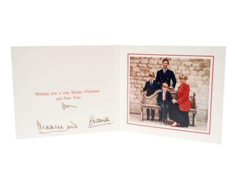 T.R.H. The Prince and Princess of Wales, signed 1991 Christmas card with twin gilt Royal ciphers to cover and colour photogra
