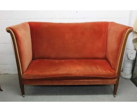 19th century high back sofa upholstery in rust velvet with mahogany frame on square taper legs terminating on brass casters, 