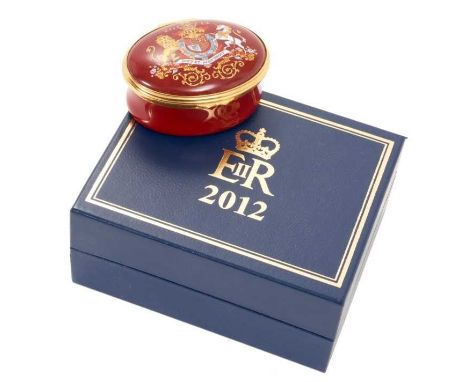 H.M.Queen Elizabeth II, 2012 Royal Household Christmas present Halcyon Days oval enamel box decorated with Royal Arms with pr