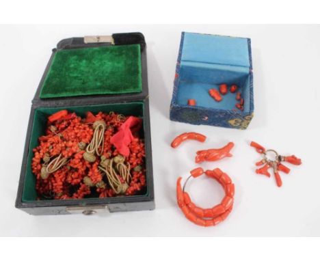 Group of antique coral jewellery to include an articulated dragon bangle, antique coral charms, necklaces etc