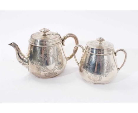 Victorian silver tea pot of tapering cylindrical form, with engraved Gothic style decoration, hinged flat top cover with stra