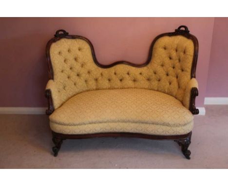 Good quality Victorian rosewood framed double ended sofa upholstered in buttoned material, carved rosewood show wood frame on