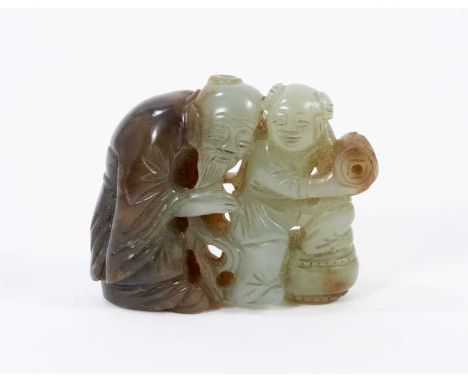 Chinese jade figural pendant, the variagated stone carved and pierced with a sage and child with a drum, 5cm wide