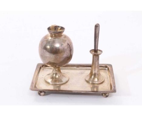 Edwardian silver table lighter in the form of a ball reservoir, with central wick and separate wand container and wand, on a 