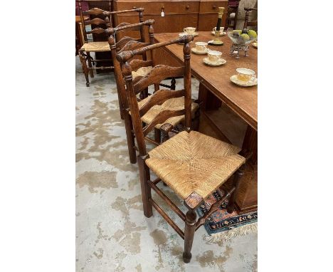 Set of eight 18th century style ladder back chairs, each with caned seat on turned understructure