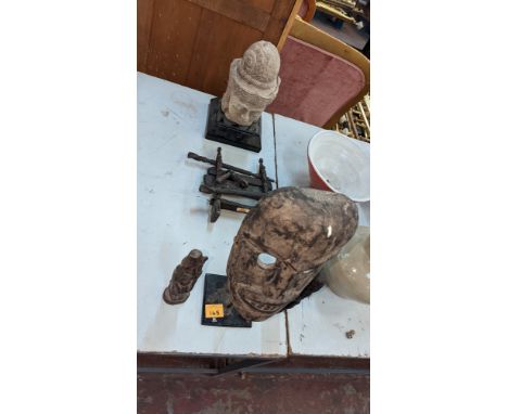 Quantity of tribal decorative objects comprising mask on stand, pair of figures, stone head on plinth &amp; unusual ornamentP