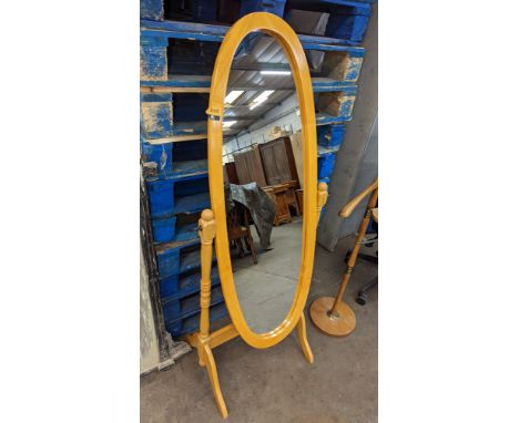 Wooden floor standing mirrorPlease note this lot is not subject to VAT. The hammer price will still be subject to our buyer's