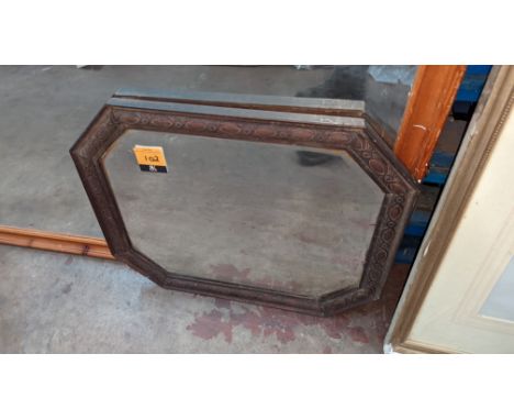 Small octagonal framed mirrorPlease note this lot is not subject to VAT. The hammer price will still be subject to our buyer'