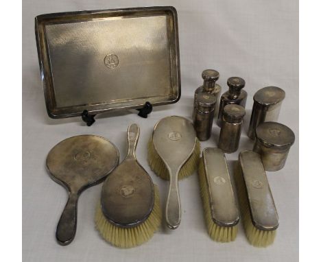 Early 20th century 12 piece silver dressing table set, London 1919 by Finnigans Ltd Manchester, with engine turned decoration